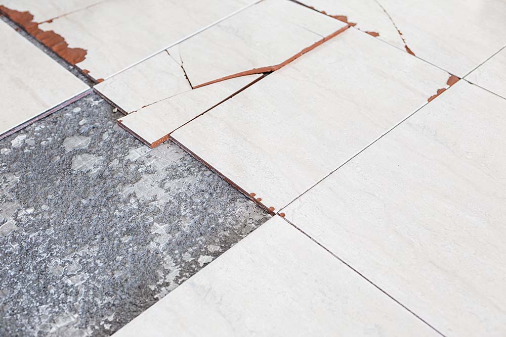Damaged floor tiles
