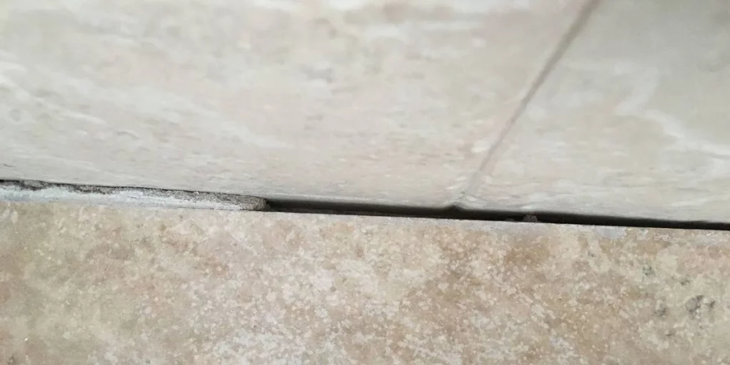 Can You Caulk Over Sealed Grout